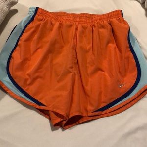 Orange Nike shorts